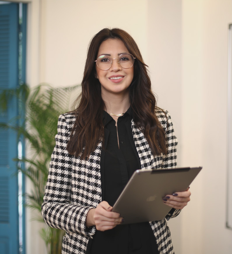 UX researcher holding a table, reporting all the research activities performed, the findings, and all the possible personas 