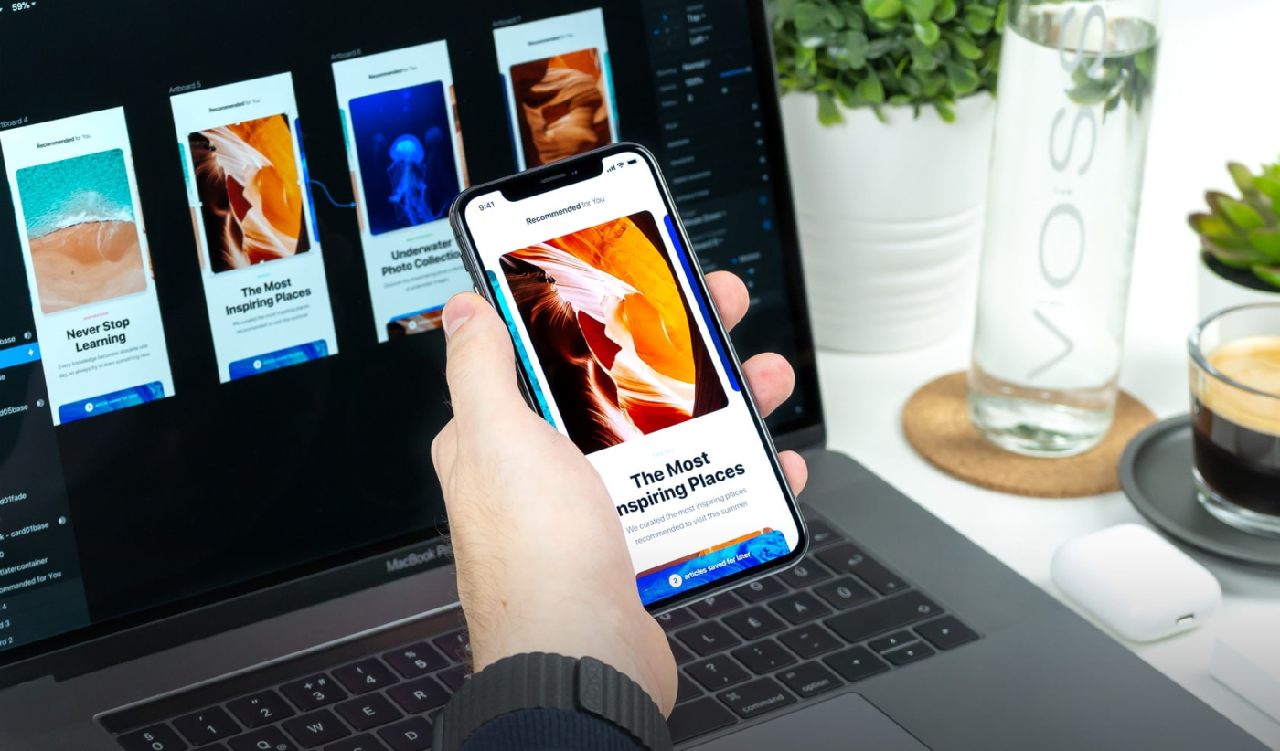 A person using a smartphone to test and enhance the user interface with visually appealing 