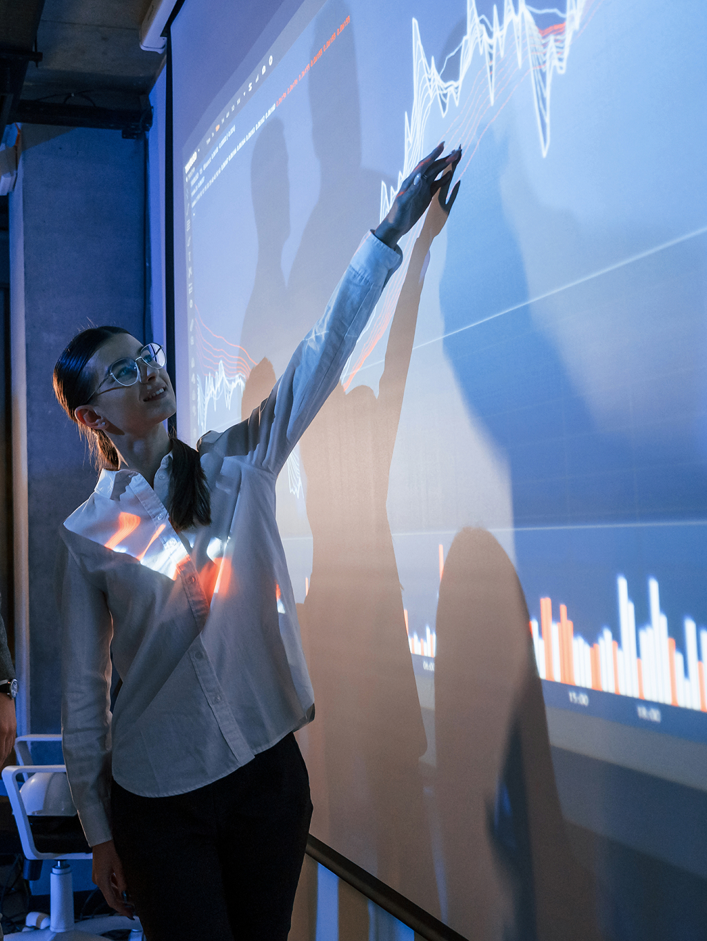 Strategist looking at a screen analyzing conversion rate